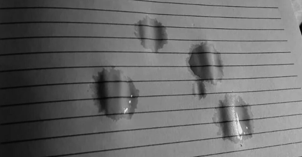 dear God with tears on the paper
